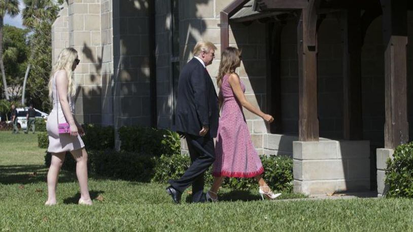 President Donald Trump, first lady Melania Trump and Tiffany Trump enter a church in Palm Beach during Easter services.