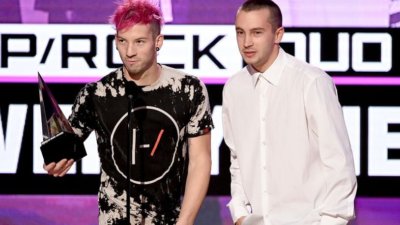 LOS ANGELES, CA - NOVEMBER 20: Musicians Josh Dun (L) and Tyler Joseph of Twenty One Pilots accept Favorite Pop/Rock Band/Duo/Group onstage during the 2016 American Music Awards at Microsoft Theater on November 20, 2016 in Los Angeles, California. (Photo by Kevin Winter/Getty Images)
