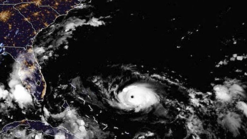 Hurricane Dorian is pictured in a NOAA satellite image at 10 p.m. Friday. The Carolinas have declared states of emergency as the storm could impact the area next week.