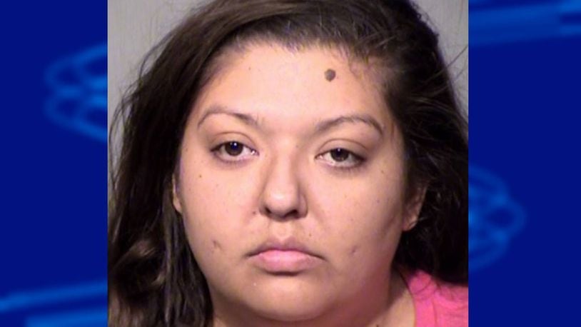 Rebecca R. Gonzales is accused of hitting her 7-year-old son in the face in a Walmart parking lot.