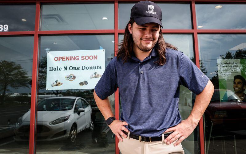 Luke Lawrence, 19, is filming for Oct. 15 to open his new Hole N One donut store on West Alex Bell Rd. Lawrence has been in the donut business since he was 14.  After high school, Lawrence attended Sinclair College.  JIM NOELKER / STAFF