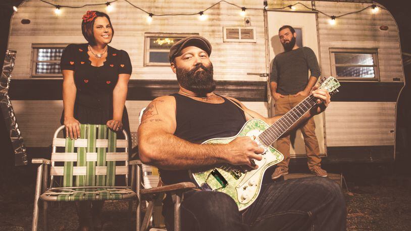 Before leaving for a European tour in mid-June, Indiana-based country blues act Reverend Peyton Big Damn Band, (left to right) Breezy, Reverend Peyton and Max Senteney, opens Levitt Pavilion Dayton's 2023 season Thursday, June 1.