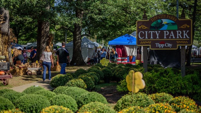 The annual Mum Festival brings crowds and colorful mums to Tipp City and its City Park. TOM GILLIAM / CONTRIBUTING PHOTOGRAPHER