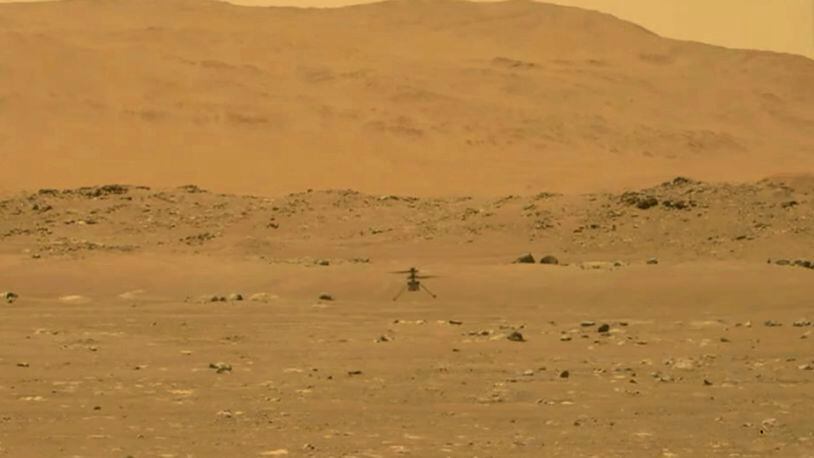 An image provided by NASA during the Ingenuity helicopter’s first flight on Mars, Monday, April 29, 2021, which lasted less than 60 seconds and reached a height of about 10 feet. The brief test of the experimental vehicle shows how explorers can study the red planet from the sky as well as the ground. (NASA via The New York Times)