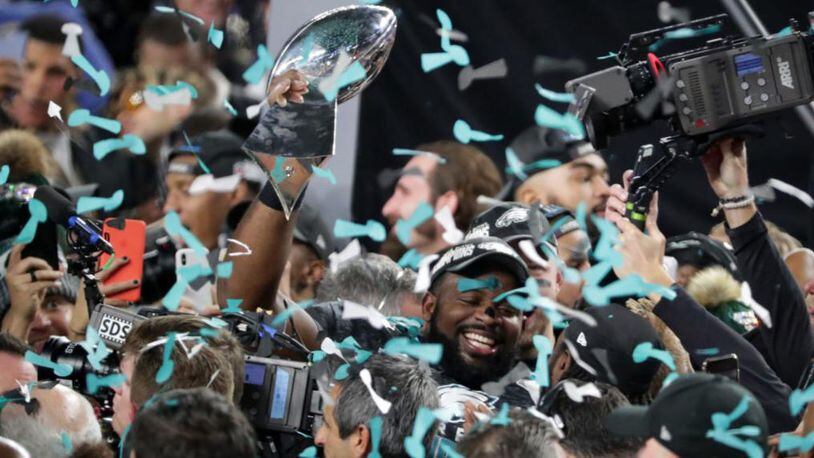 Brandon Graham, #55 of the Philadelphia Eagles, celebrates with the Vince Lombardi Trophy after his teams 41-33 win over the New England Patriots in Super Bowl LII at U.S. Bank Stadium on February 4, 2018 in Minneapolis, Minnesota.