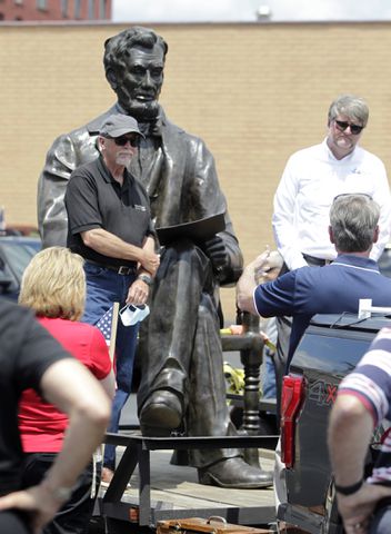 PHOTOS: 1,700 pound Abraham Lincoln catches a ride from Urbana to Dayton