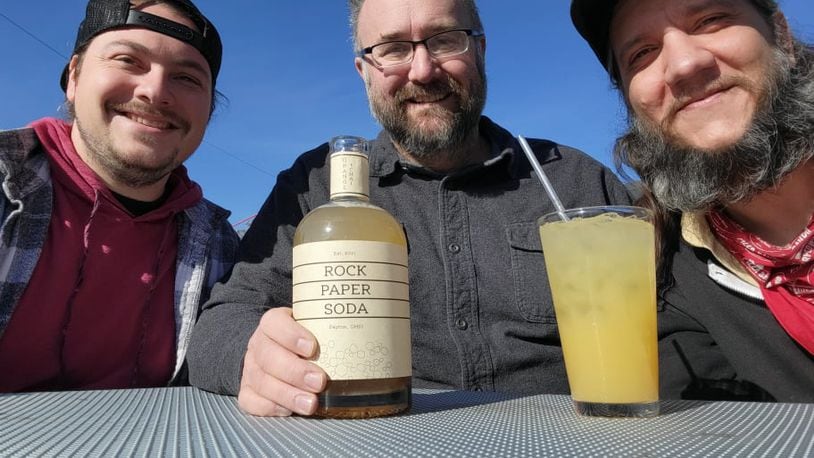 Rock, Paper, Soda is a brand new craft soda brand that will launch tomorrow, Nov. 18 at a pop-up food event at Yellow Cab Tavern from 6 p.m. to 9 p.m. Founders of the new soda brand are James Burton (left), The Pizza Bandit chef and partner, Shane Anderson (middle), Ghostlight Coffee founder and owner, and Brian Johnson (right), The Pizza Bandit partner.