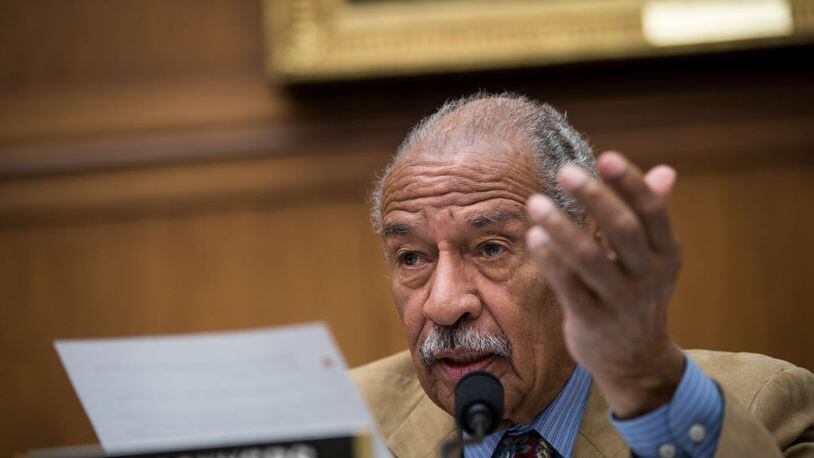 Rep. John Conyers stepped down from the House Judiciary Committee on Sunday.