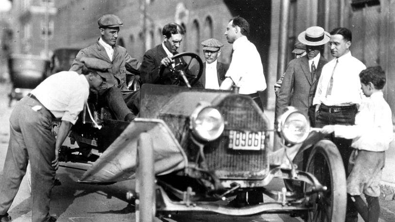 Charles F. Kettering, at the wheel and Bill Chryst, in passenger seat, test the Delco self starter system that Kettering invented in Dayton. PHOTO COURTESY OF DAYTON HISTORY