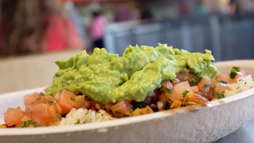 Chipotle announced Monday, Feb. 10,  that to celebrate the upcoming one-year anniversary of Chipotle Rewards, it is launching "Guac Mode" and will give away free guacamole and extras to current and new loyalty program members throughout 2020. JOE RAEDLE/GETTY IMAGES