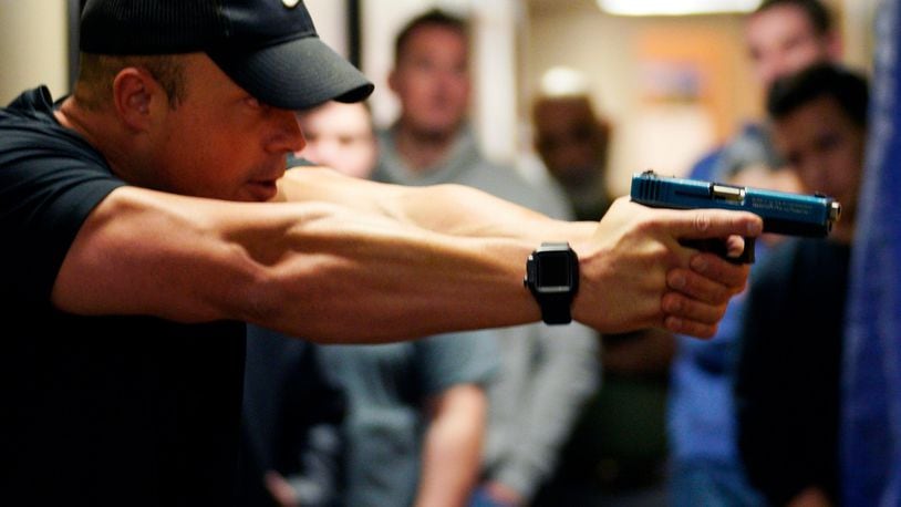FILE PHOTO: Joe Deedon, former law enforecement officer and owner of Tac*One Consulting (L), teaches a "Lone Wolf" civilian active shooter response course for concealed weapons permit holders on March 24, 2018 in Longmont, Colorado. The class, based on a similar law enforcement course, is designed to challenge students mentally and physically leaving with a solid plan to defend themselves and others during the critical first moments of a deadly attack. (Photo by Rick T. Wilking/Getty Images)