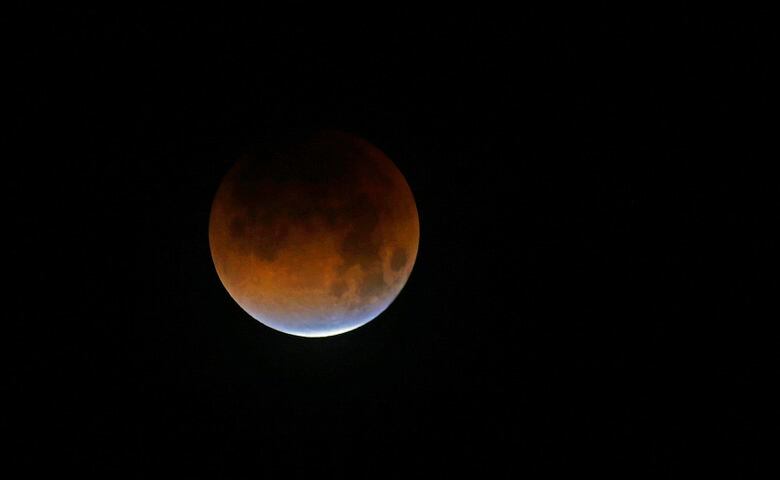 Photos: Super blue blood moon eclipse 2018