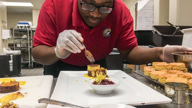 Table 33, 130 W. Second St. in downtown Dayton, will host Pave the Path: A Ponitz Collaborative Pop-Up 6 p.m. The event is a fundraiser for a senior trip to  European  for students in the Ponitz Culinary Program at David H Ponitz Career Technology Center in Dayton. Senior Keiontae Boykin practices the dessert course.