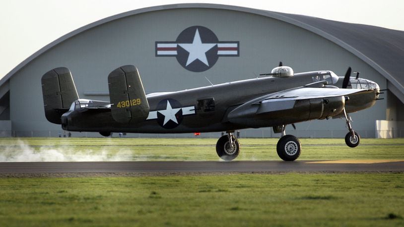 A B-25 Mitchell bomber lands at the National Museum of the U.S. Air Force in April 2o10. DAYTON DAILY NEWS FILE PHOTO