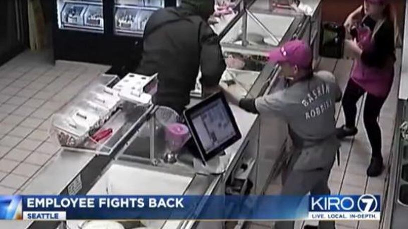 Police are still searching for a robbery suspect after a Baskin-Robbins employee fought off the man Nov. 25. (Photo: Screengrab via KIRO7.com)