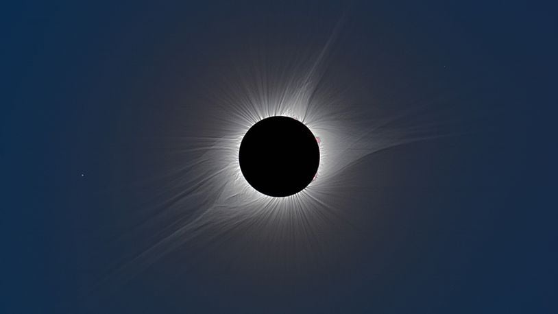 The total phase of the Aug. 21, 2017, solar eclipse as seen from Madras, Oregon. This is a composite of short, medium, and long exposures, as no single exposure can capture the huge range of brightness exhibited by the solar corona. The star to the left (east) of the eclipsed sun is Regulus, the brightest star in the constellation Leo. NASA/Courtesy Rick Fienberg / TravelQuest International; additional processing by Sean Walker, Sky & Telescope.