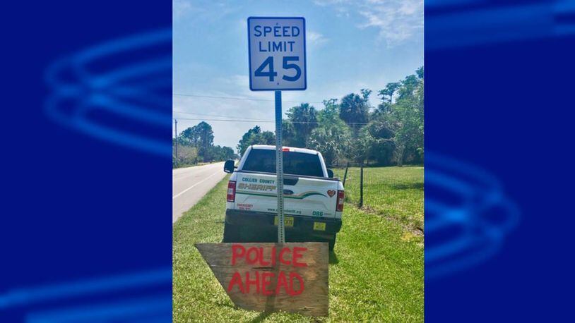 An anonymous sign in southwest Florida warned motorists to slow down, as there was a speed trap a mile ahead..