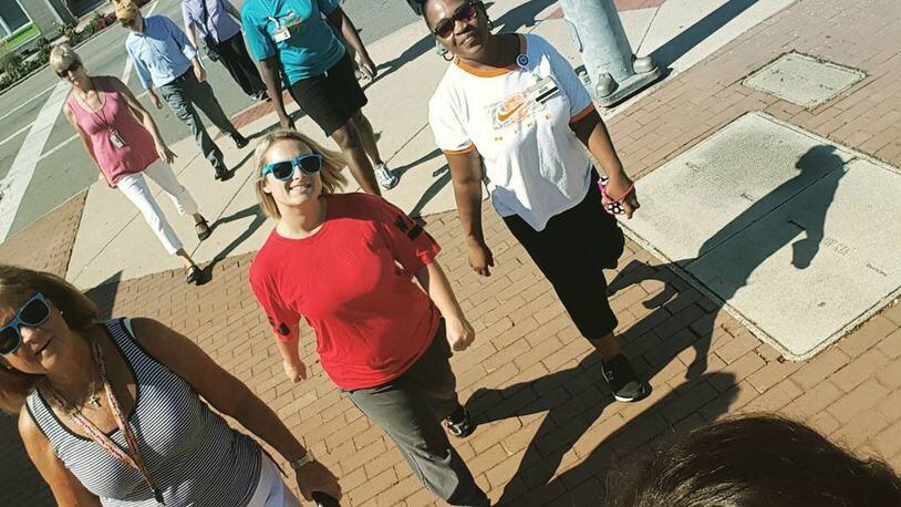 The weekly lunchtime walks depart from Courthouse Square at 12:10 p.m. on Wednesdays through September are a joint effort between the Downtown Dayton Partnership and Public Health Dayton & Montgomery County. CONTRIBUTED