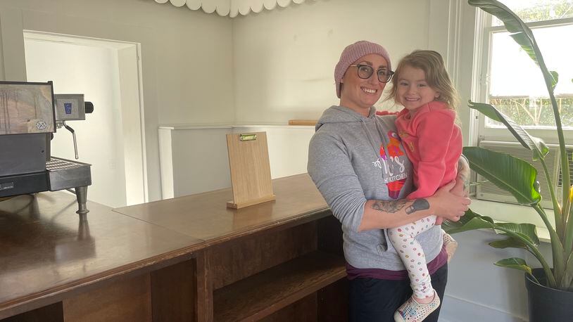 Pictured is Paige Woodie, the owner of Val's Home Bakery, and her daughter, Finnley, in the space that will soon be a second location for the bakery.