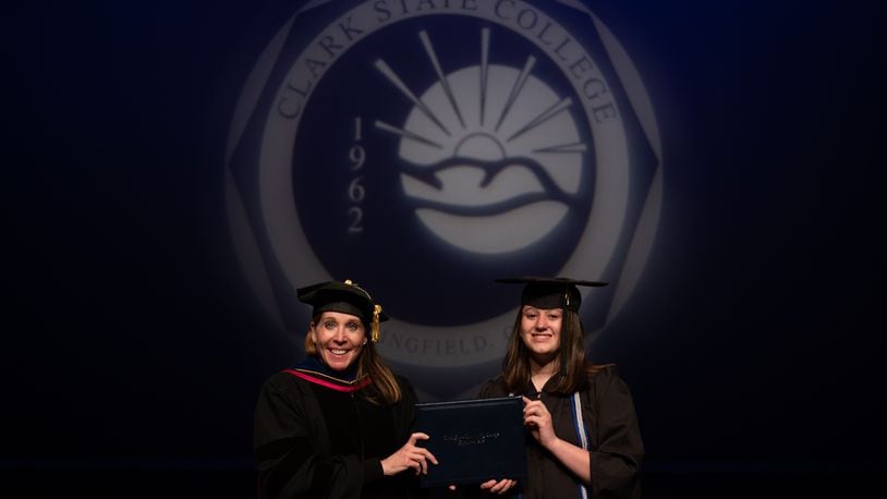 Lanna Kunzelman with Clark State President Dr. Jo Alice Blondin as she receives her associate's degree. CONTRIBUTED