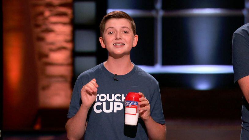 Carson Grill, 15, a freshman at Bishop Fenwick High School, and his father will appear on "Shark Tank" at 8 p.m. Friday. SUBMITTED PHOTO