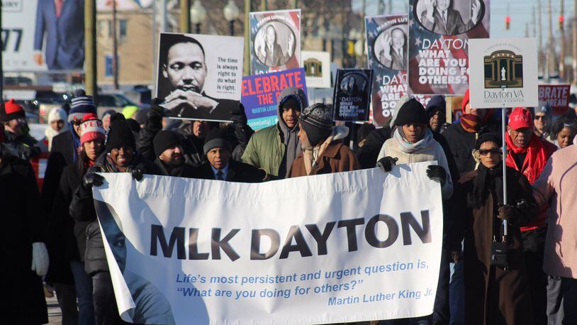 Hundreds of people gathered in Dayton on Martin Luther King, Jr. Day 2019 to march in celebration of the civil rights leader. Marchers started near The Charles Drew Health Center on West Third Street and ended at the Dayton Convention Center.