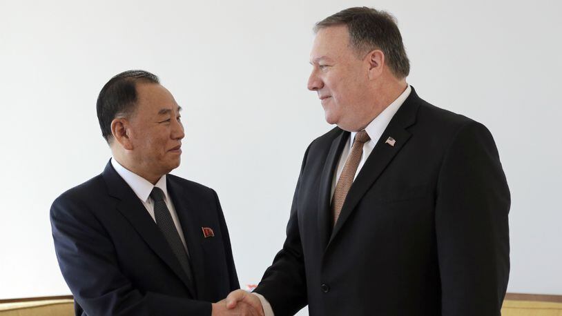 Kim Yong Chol, former North Korean military intelligence chief and one of Kim Jong Un's closest aides, left, and U.S. Secretary of State Mike Pompeo pose for a picture before a meeting, Thursday, May 31, 2018, in New York.