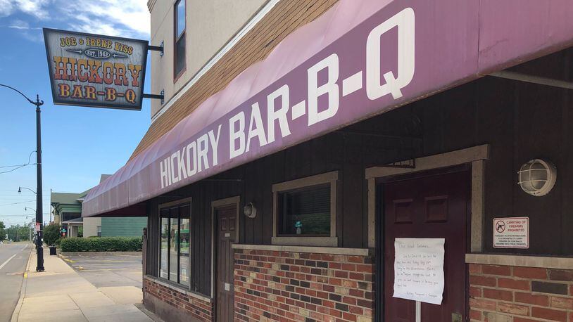 Hickory Bar-B-Q, the iconic Brown Street restaurant that was founded 58 years ago, is shut down until July 24 'due to COVID-19," according to a sign on the restaurant's door.