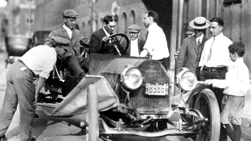 Charles F. Kettering, at the wheel and Bill Chryst, in passenger seat, test the Delco self starter system that Kettering invented in Dayton. PHOTO COURTESY OF DAYTON HISTORY