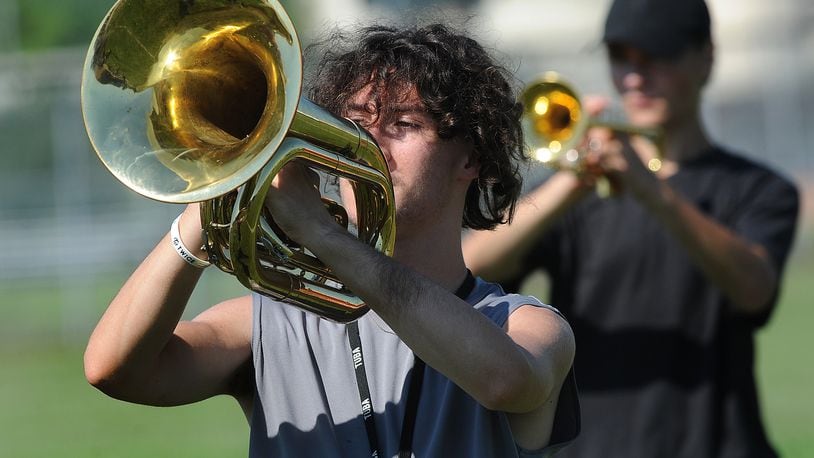 Members of the West Carrollton Marching Band practice Thursday, Aug. 11, 2022. MARSHALL GORBY/STAFF
