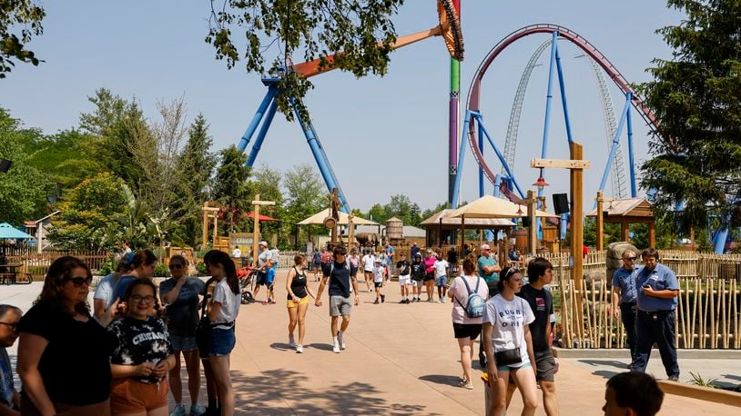 Kings Island visitors got to experience the newest themed area "Adventure Port" before the official opening day Friday, June 9, 2023 in Mason. The area features Enrique's Restaurant and Mercados Patio Bar, Adventure Express coaster and two new rides, Sol Spin and Cargo Loco. NICK GRAHAM/STAFF