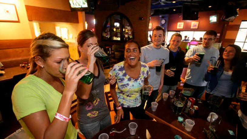 Patrons of Milano's and Buffalo Wild Wings on Brown Street started their day with Blue Beer on Wednesday, March 10, 2010 as an early start to St. Patrick's Day celebrations for UD Students.
